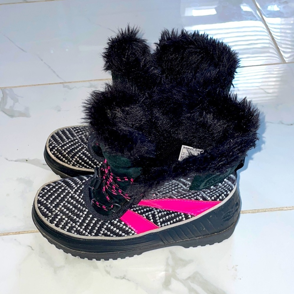 Sorel pink and black ankle boot